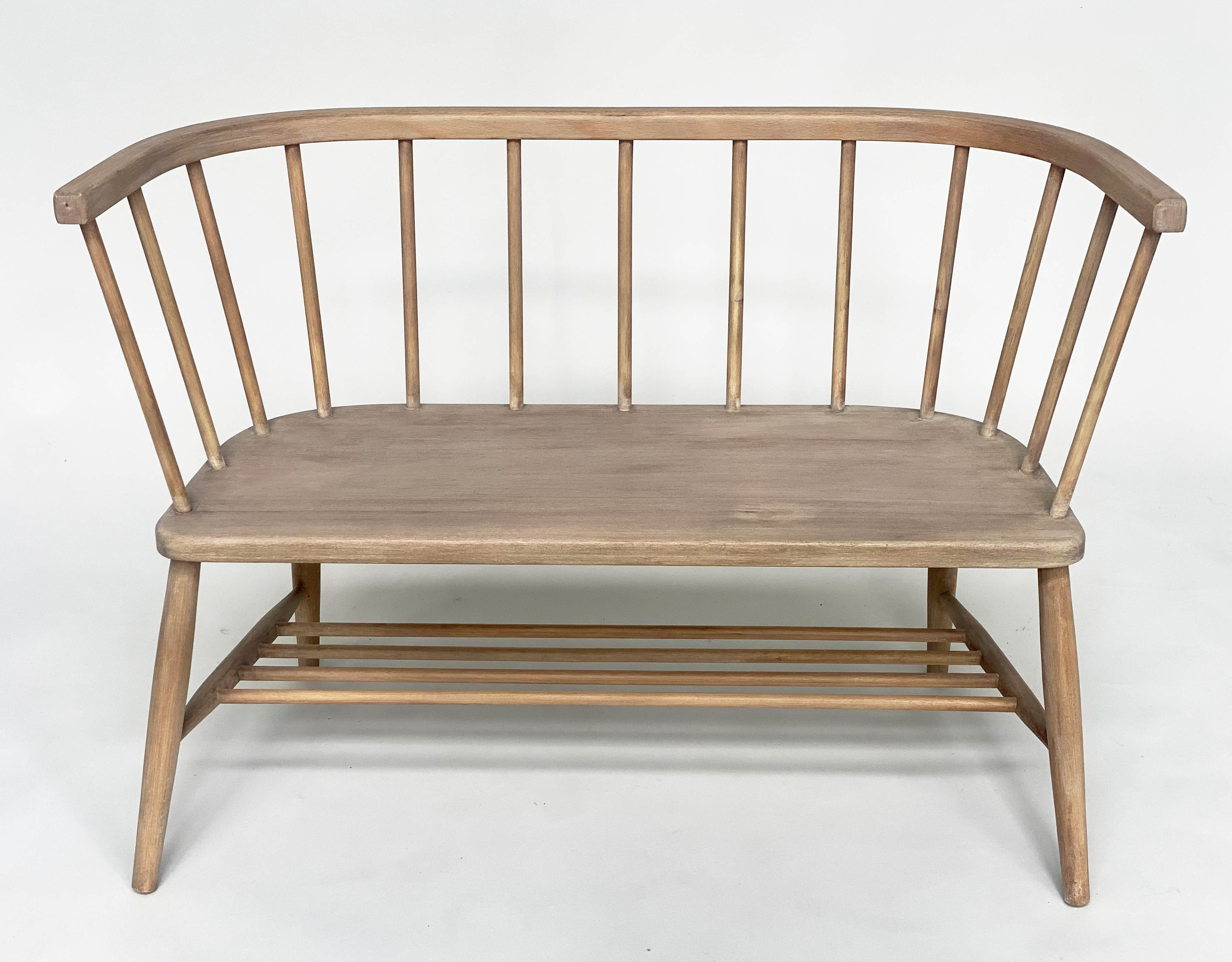 HALL SEAT, English 1970s beech and elm in the manner of Ercol with enclosed rail back and shaped