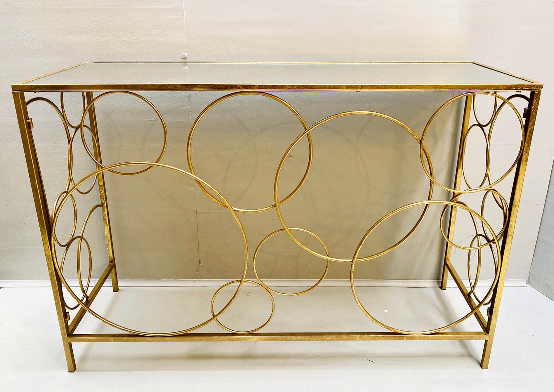 BUBBLE DESIGN CONSOLE TABLE, 80cm high, 120cm wide, 40cm deep, gilt base, mirrored top.