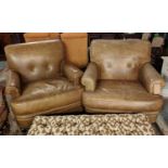 ARMCHAIRS, a pair, 99cm W x 93cm H with distressed tan leather upholstery. (2)