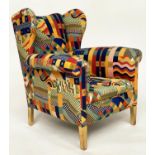 WING ARMCHAIR, 1970s Collier Campbell, 'Bauhaus' fabric upholstered with square tapering gilt oak