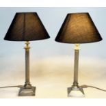TABLE LAMPS, a pair, Regency style silver plated with reeded columns, Corinthian style capitals
