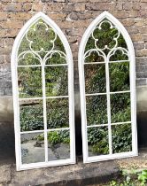 ARCHITECTURAL GARDEN MIRRORS, a pair, Gothic style painted metal frames with overlaid detail,