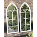 ARCHITECTURAL GARDEN MIRRORS, a pair, Gothic style painted metal frames with overlaid detail,