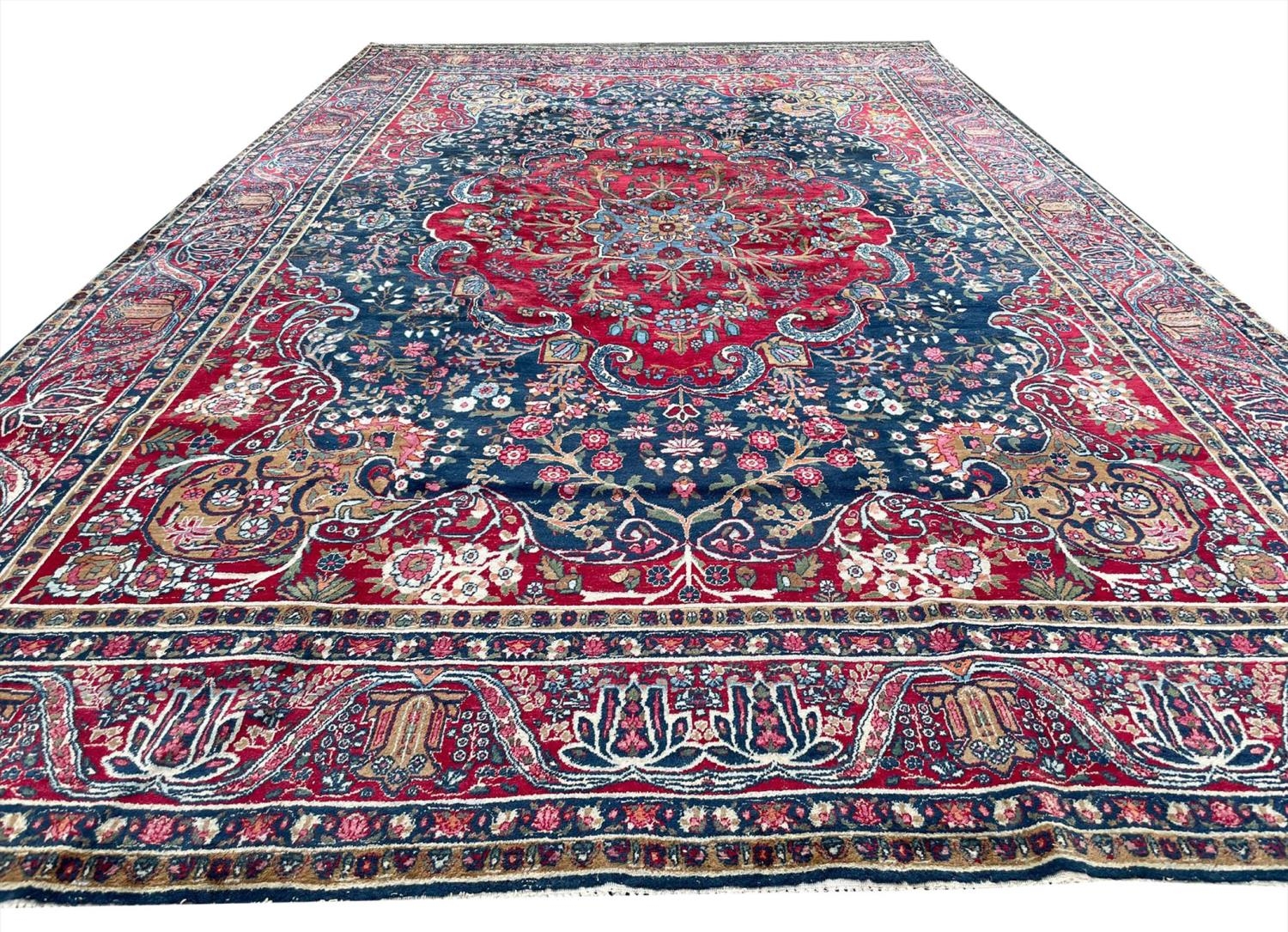 ANTIQUE KERMAN LAVER CARPET, 510cm x 315cm.