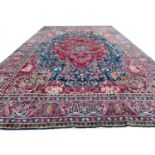 ANTIQUE KERMAN LAVER CARPET, 510cm x 315cm.