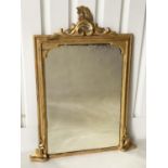 OVERMANTEL MIRROR, 19th giltwood rectangular with carved crest and C scroll supports, 102cm H x 78cm