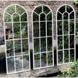 ARCHITECTURAL GARDEN MIRRORS, a set of three, regency style, painted metal frames with overlaid