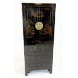 CHINOISERIE CABINET, ebonised and gilt decorated with two panelled doors above two drawers, 182cm