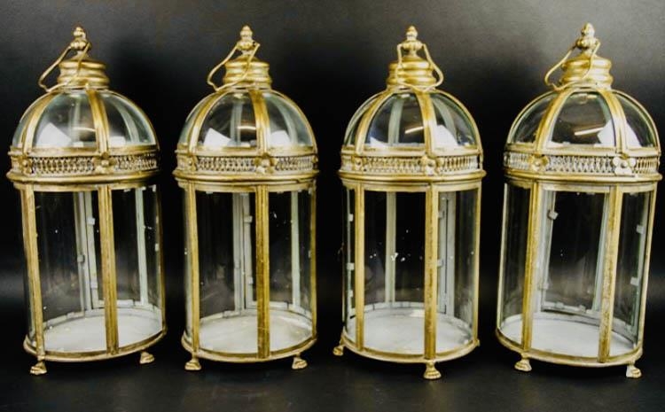 STORM LANTERNS, a set of four, Regency style with gilt metal frames, 46cm high, 19cm diameter (4)