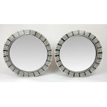 WALL MIRRORS, a pair, 1970's Italian design, Greek key inlaid circular frames, 61cm diam. (2)