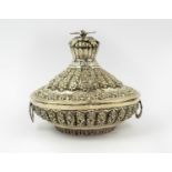 OTTOMAN SILVER REPOUSSE JEWELLERY BOX, 19th century, tureen form with rosette decoration and a