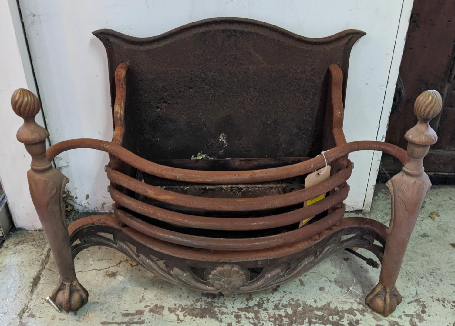 FIRE GRATE, early 20th century cast iron with brass facias, in the Georgian style, 53cm H x 75cm W x