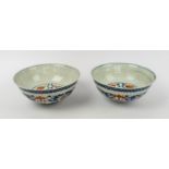 CHINESE DOUCAI ENAMELED BOWLS, a pair, underglaze blue with foliate enamel decoration character mark