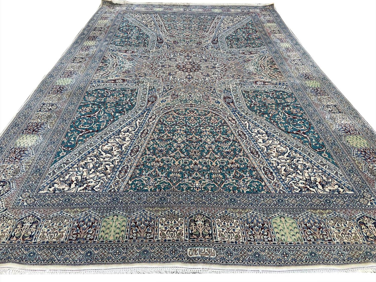 VERY FINE SIGNED HABIBIAN NAIN CARPET, 315cm x 203cm.