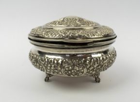 OTTOMAN SILVER REPOUSSE LIDDED BOX, with repeat rosette foliate patterned decoration, Egyptian