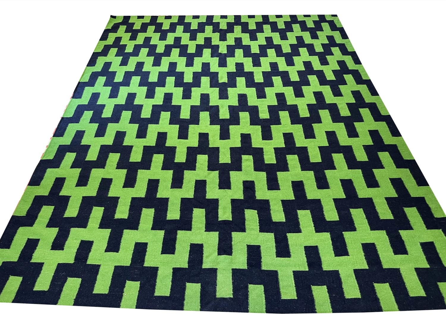 JONATHAN ADLER FLATWEAVE CARPET, 317cm x 246cm.