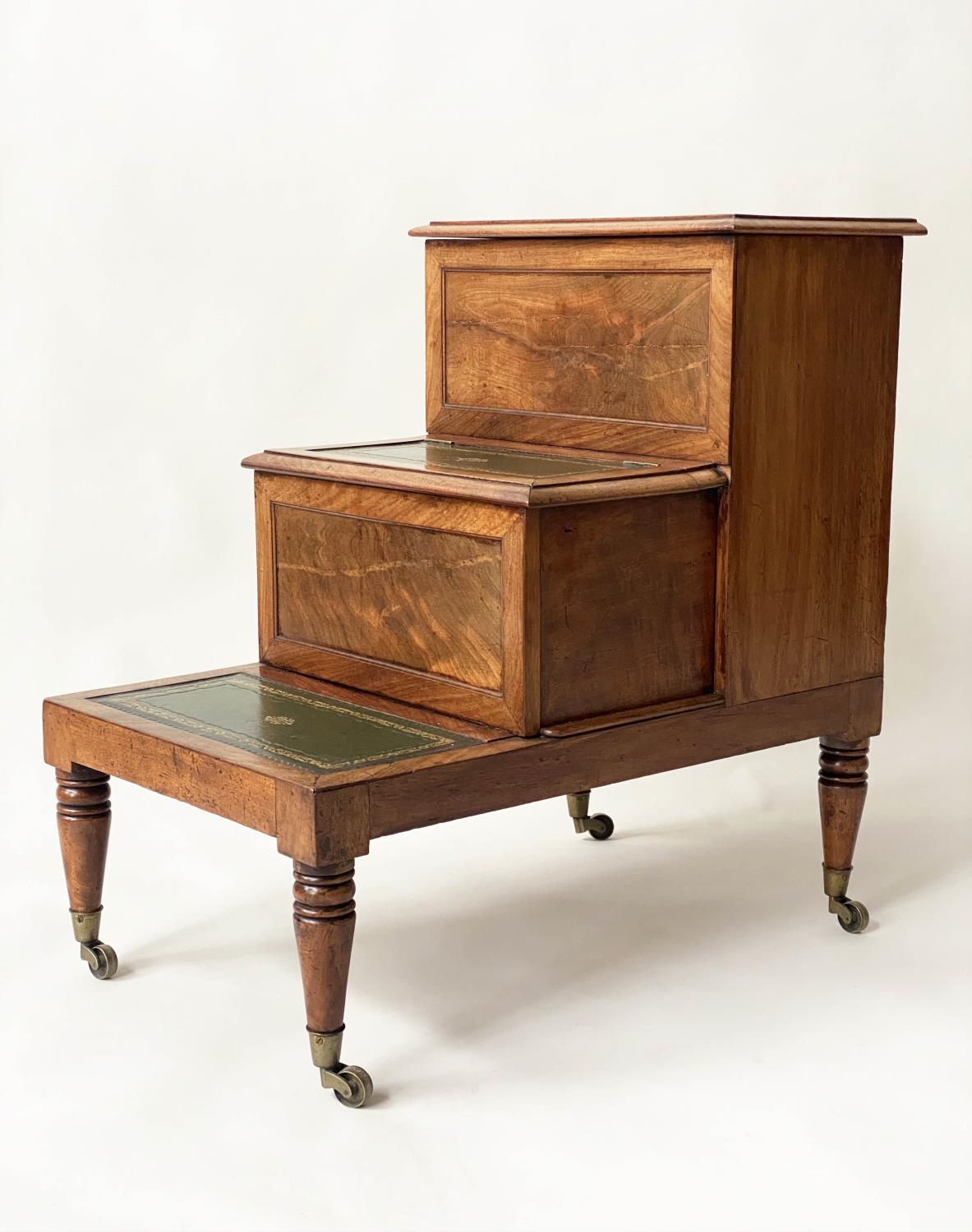 LIBRARY BED STEPS, early 19th century mahogany with three tooled leather tread steps, 70cm H x