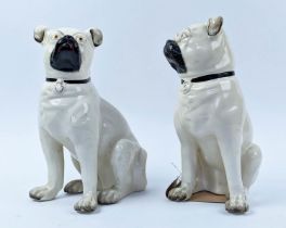 STAFFORDSHIRE PUG DOGS, an opposing pair, late 19th century, 27cm H.