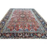 ANTIQUE PERSIAN HERIZ CARPET, 295cm x 218cm.