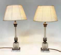 TABLE LAMPS, a pair, with cut glass columns, silvered metal mounts, square plinth and marble base (