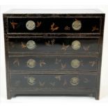 CHINOISERIE CHEST, ebonised and gilt decorated with four long drawers, 97cm H x 105cm x 45cm.