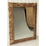 FLORENTINE WALL MIRROR, 19th century Italian carved giltwood with pierced cushion frame, 120cm W x