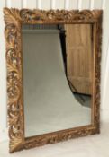 FLORENTINE WALL MIRROR, 19th century Italian carved giltwood with pierced cushion frame, 120cm W x