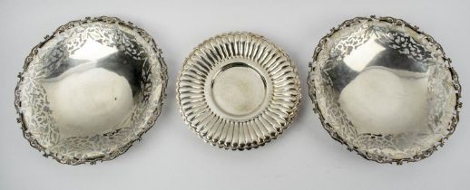 SILVER DISHES, a pair, pierced and etched with Egyptian marks along with a gadrooned rim silver