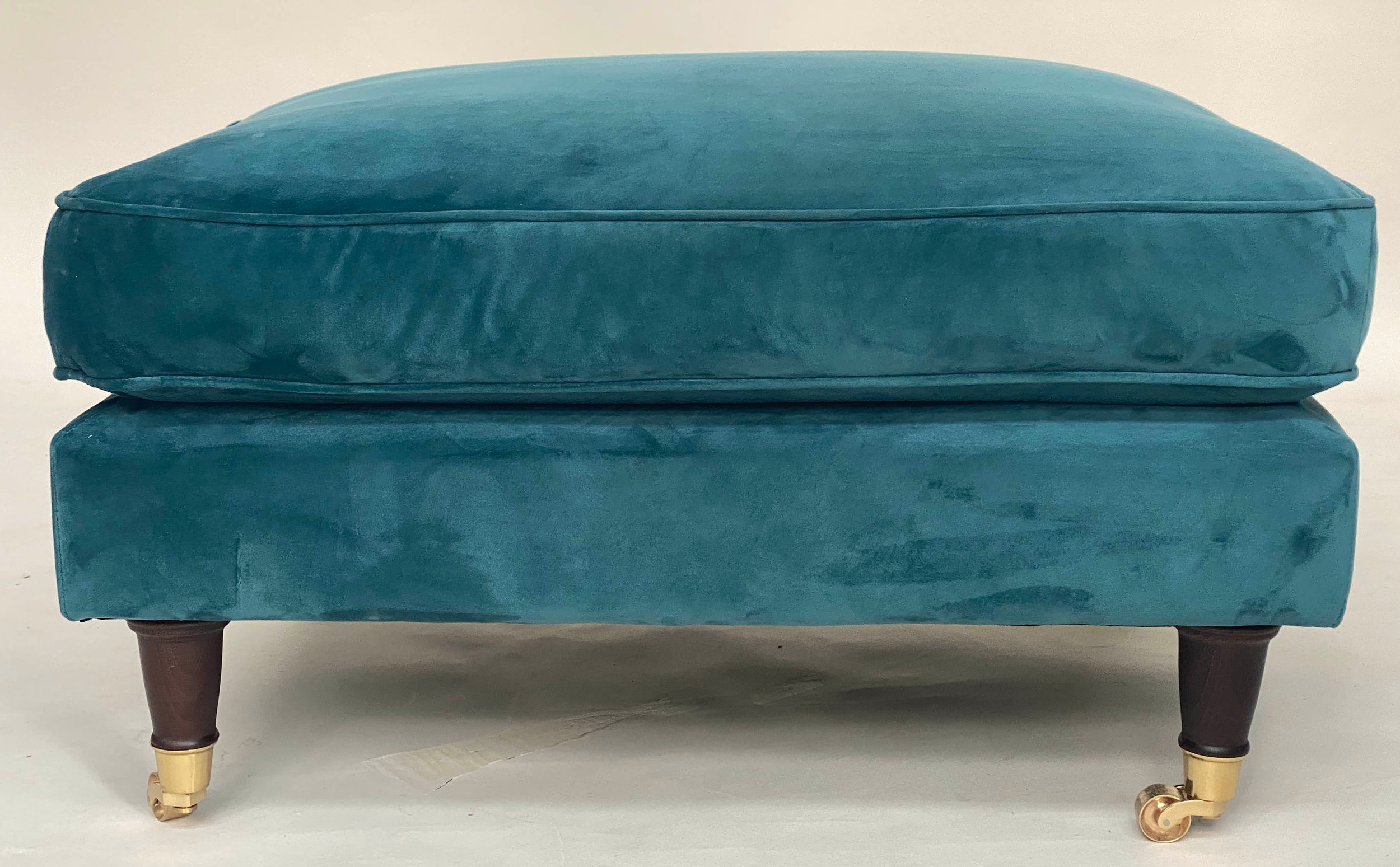 FOOTSTOOL, contemporary ocean blue velvet upholstered, turned supports with gilt metal castors, 76cm - Image 4 of 4