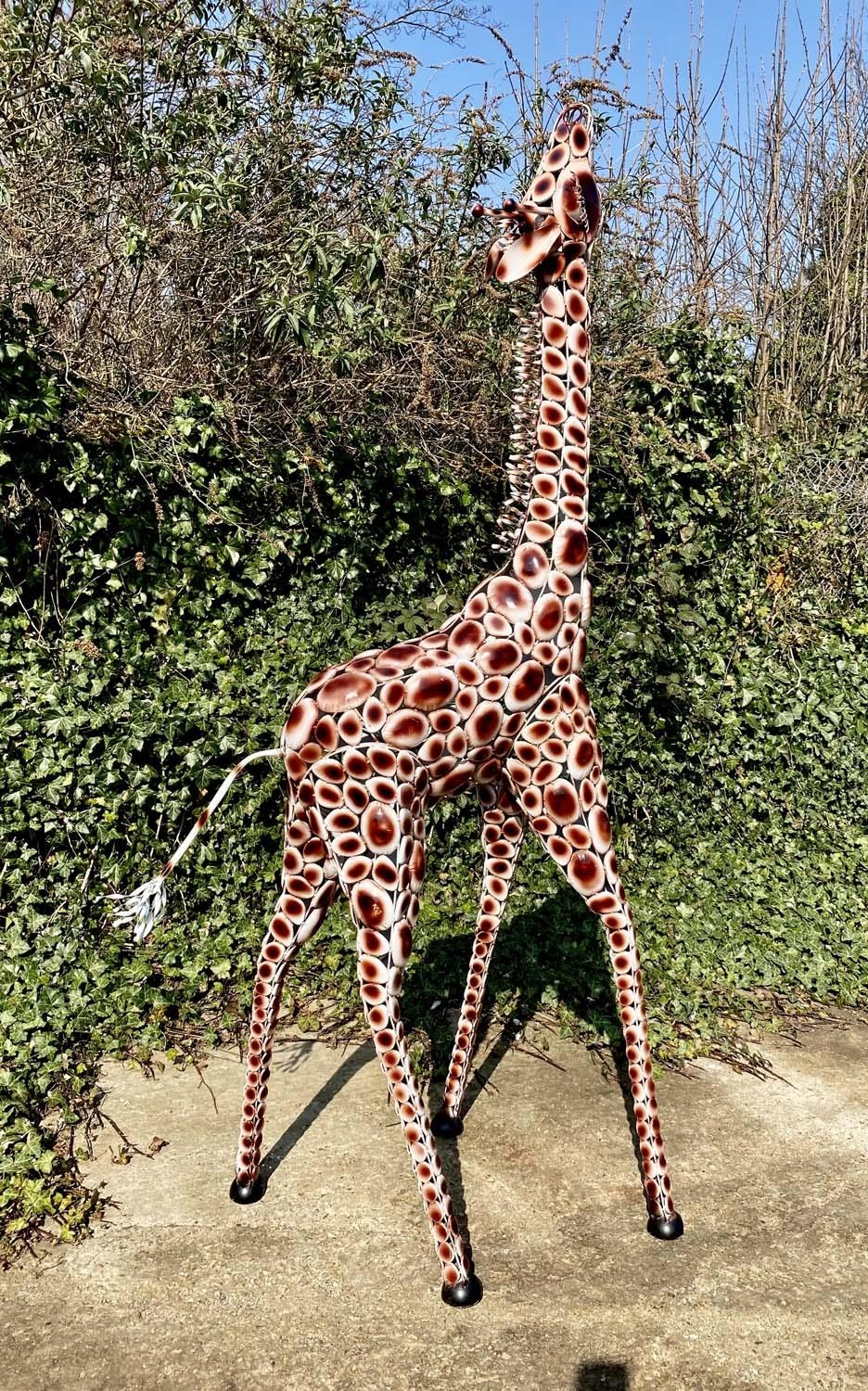 CONTEMPORARY SCHOOL SCULPTURAL GIRAFFE, stylised painted metal 230cm x 75cm.