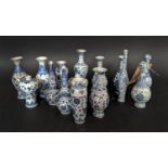 MINIATURE VASES, a collection of sixteen, 19cm H, Chinese export style blue and white ceramic,