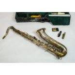 COUESNON MONOPLOE SAXOPHONE SILVER PLATED, with inscription and case.