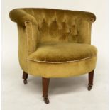 ARMCHAIR, Edwardian mahogany with deep buttoned bow back, golden yellow velvet upholstered and