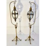 LANTERNS ON STANDS, a pair, each 163cm high, 35cm across, in the Regency style, gilt metal frames (