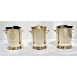 CHAMPAGNE BUCKETS, a set of three, 24cm H, each stamped Louis Roederer. (3)
