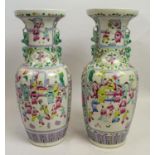 CHINESE VASES, a pair, mid 20th century famille rose enamel decoration with cartouche and figural