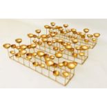 MULTI TEA LIGHT HOLDERS, set of three, each measuring 13cm high, 56cm wide, 18cm deep, gilt metal,