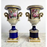 URNS, a pair, 19th century porcelain, possibly Derby, unmarked. 25cm H. (2)