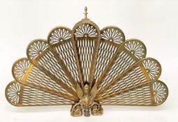 'FAN' FIREGUARD, 19th century style pierced brass foldout with winged griffin centre, 63cm H x