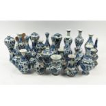 MINIATURE VASES, a collection of twenty five, 17cm approx. at tallest, Chinese export style blue and