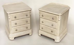 BEDSIDE CHESTS, a pair, French style grey painted each with three drawers and silvered knobs, 51cm W