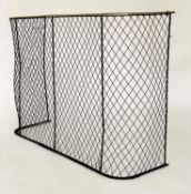 NURSERY FENDER, 19th century wrought iron and brass bound with mesh, panelling, 200cm W x 30cm D x