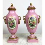 SERVES PORCELAIN URNS, a pair, hand painted with scenes of courting lovers and flowers to reverse