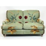 HOWARD STYLE SOFA, two seater, upholstered in Nina Campbell Pomegranate Tree fabric, 147cm W x