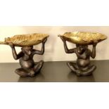 TRINKET DISHES, a pair, 33cm x 40cm x 18cm, in the form of monkeys holding aloft banana leaves (2)