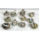 STAFFORDSHIRE POTTERY NOVELTY BIRDS NEST INKWELLS, a collection of eleven, mid 19th century, each