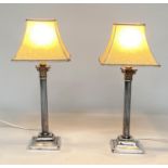 SILVER PLATED TABLE LAMPS, a pair, early 20th century silver plated each Corinthian capped with