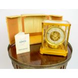 JAEGER LE COUTRE VINTAGE CLOCK, cased with manual, 23cm H x 21cm x 16cm diam.