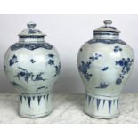 TRANSITIONAL 'HATCHER CARGO' OCTAGONAL BLUE & WHITE BALUSTER VASES, a pair, circa 1640, with lids,