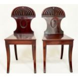 REGENCY HALL CHAIRS, a pair, circa 1810, mahogany with reeded waisted backs and sabre supports, 38cm